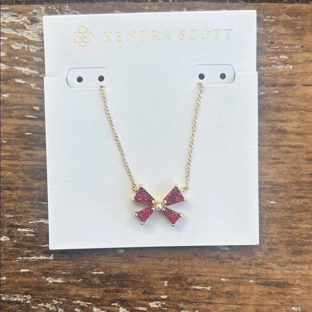 Kendra Scott Gold Necklace with Red Bow Pendant